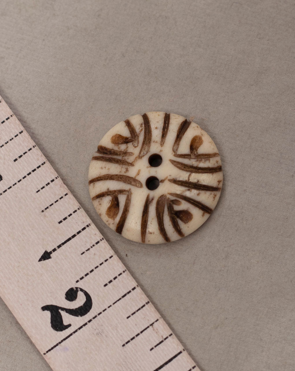 Engraved Bone Buttons - Fabriclore.com