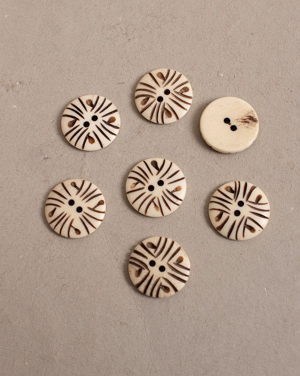 Hand Carved Bone Button ( Single Piece ) - Fabriclore.com