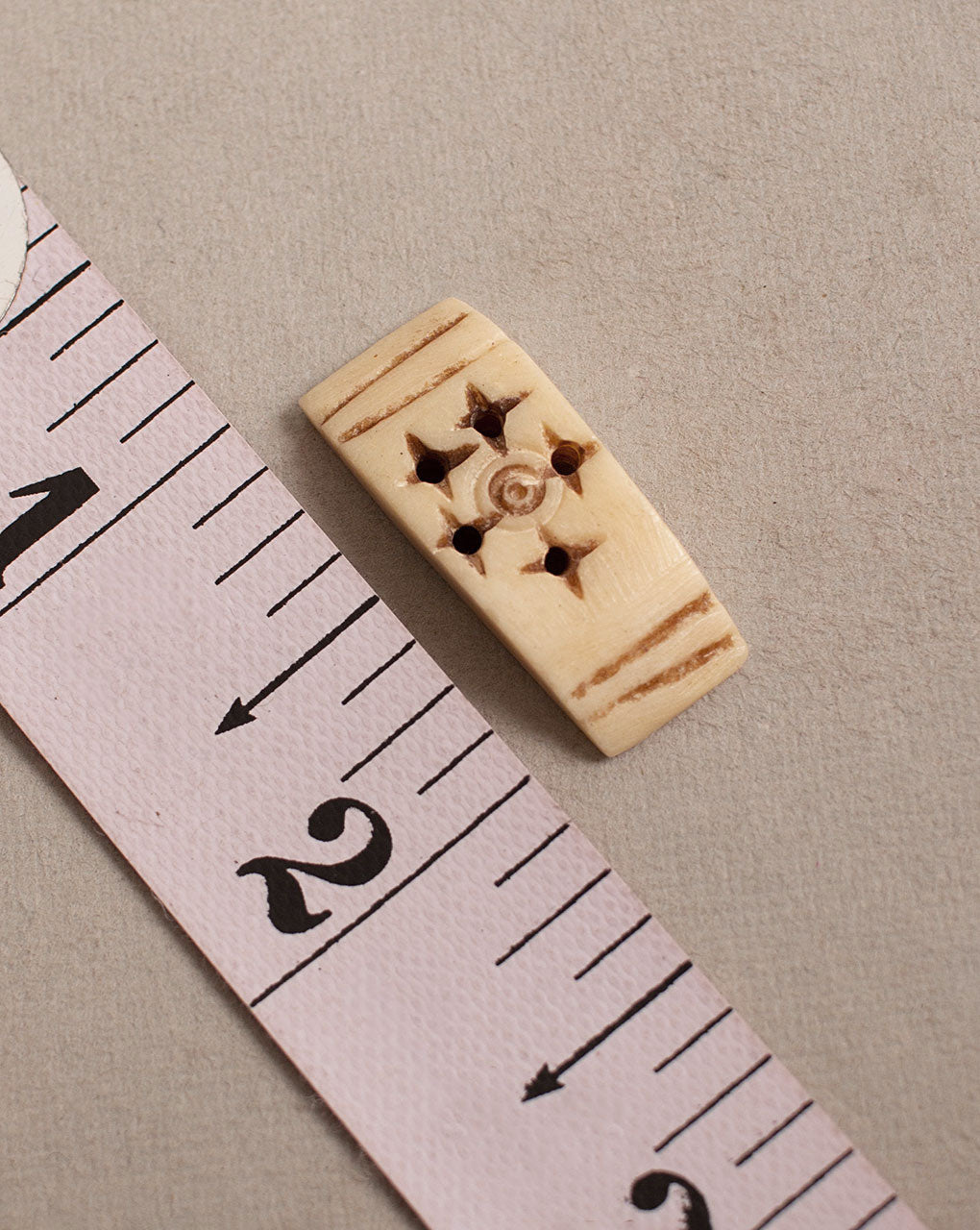 Hand Carved Bone Button ( Single Piece ) - Fabriclore.com