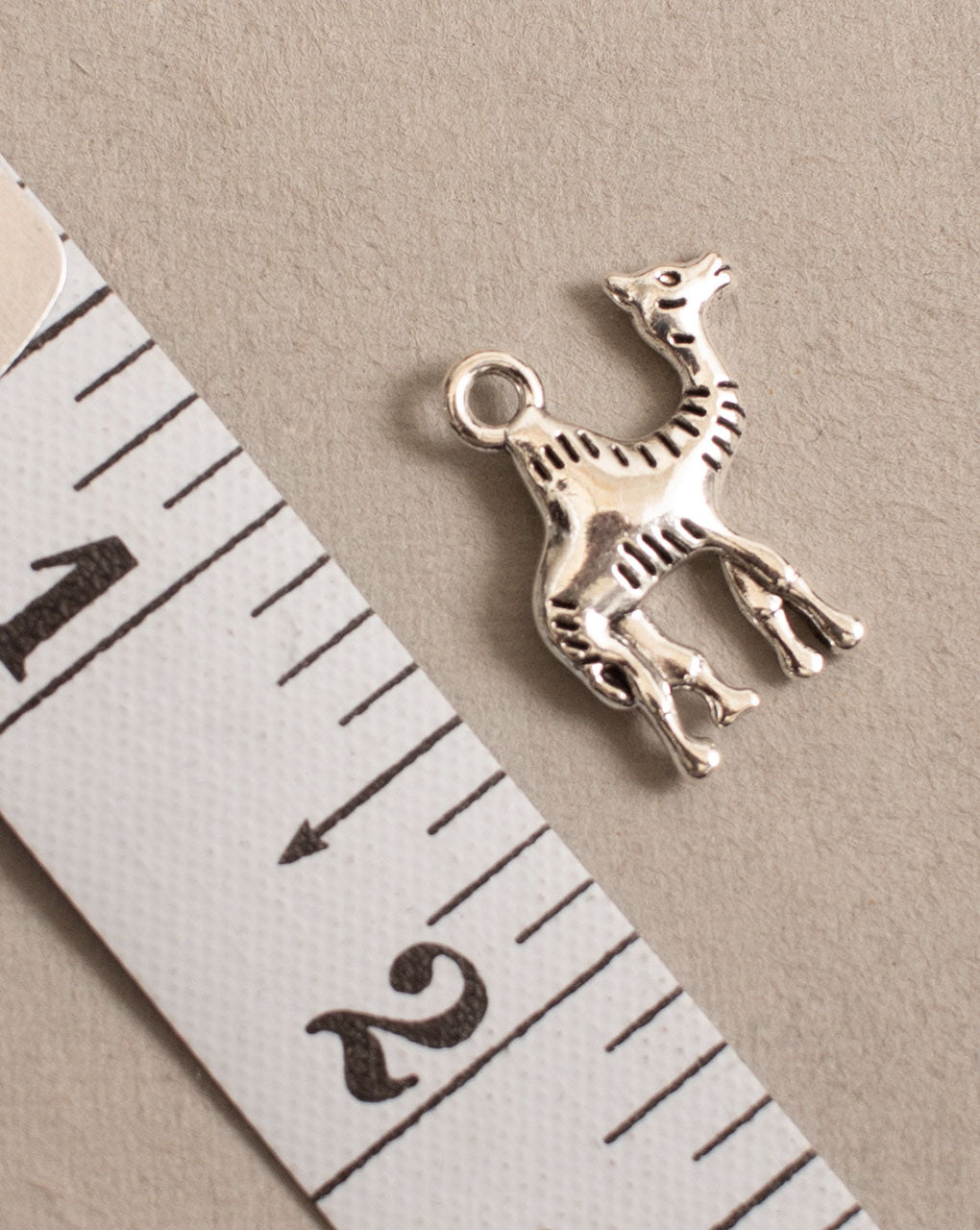 Antique Metal Casting Charm - Fabriclore.com