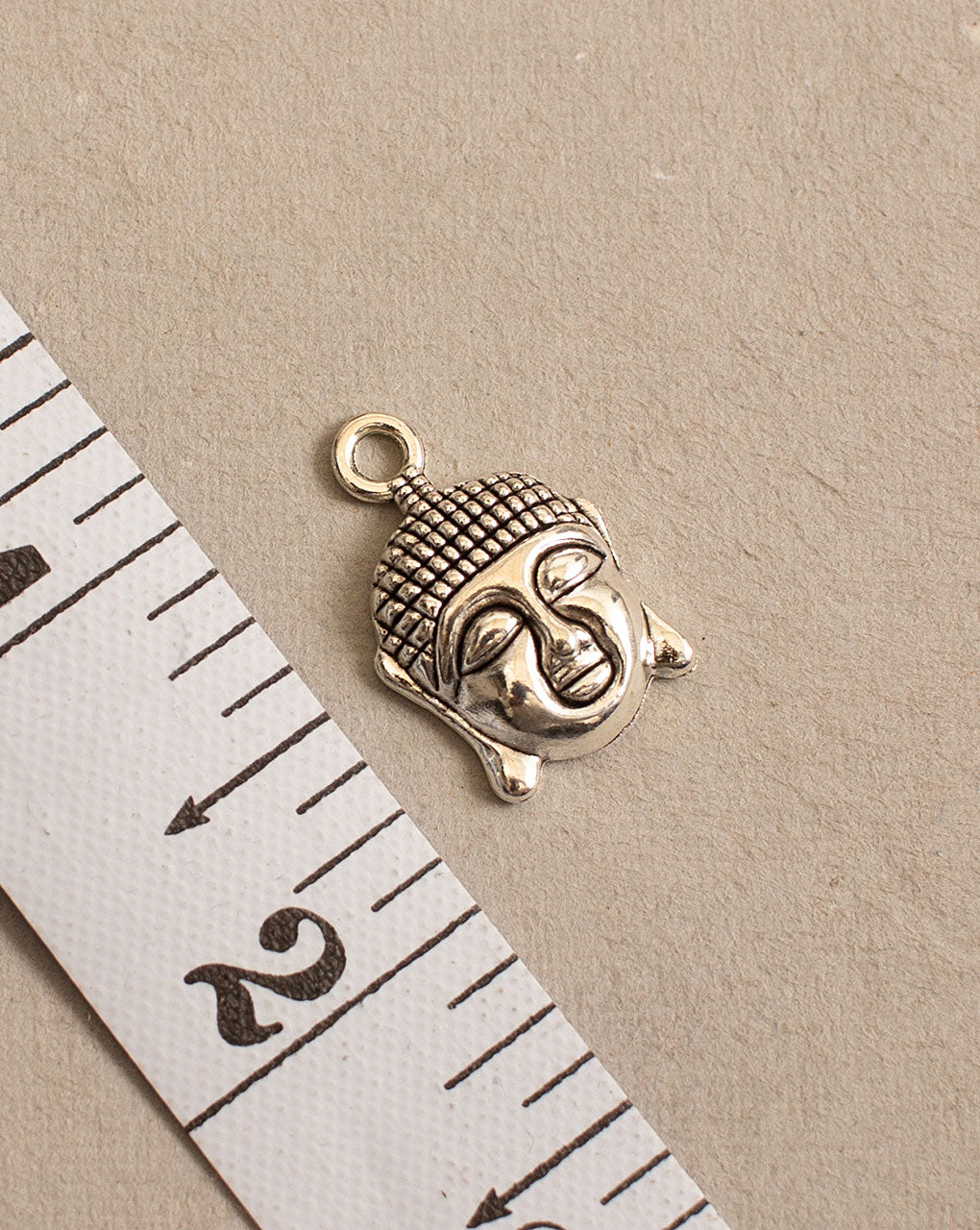 Antique Metal Casting Charm - Fabriclore.com