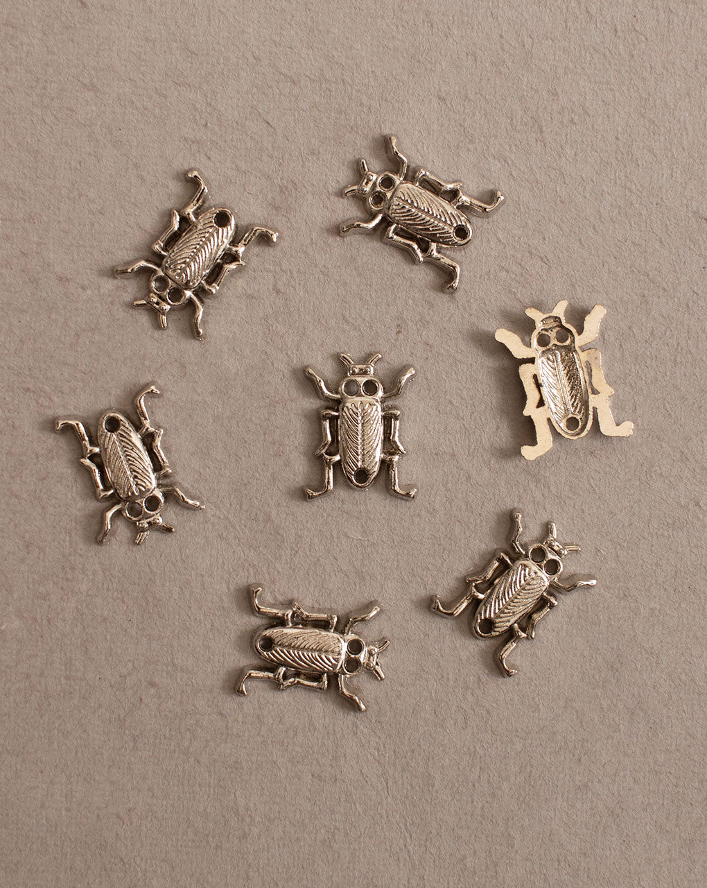 Antique Metal Casting Charm - Fabriclore.com