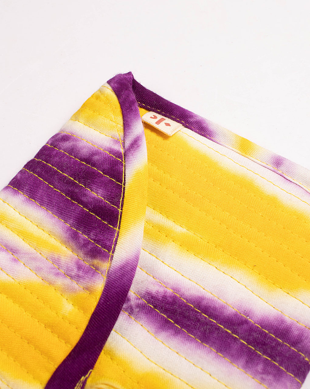 Handcrafted Rayon Quilted Clutch - Fabriclore.com