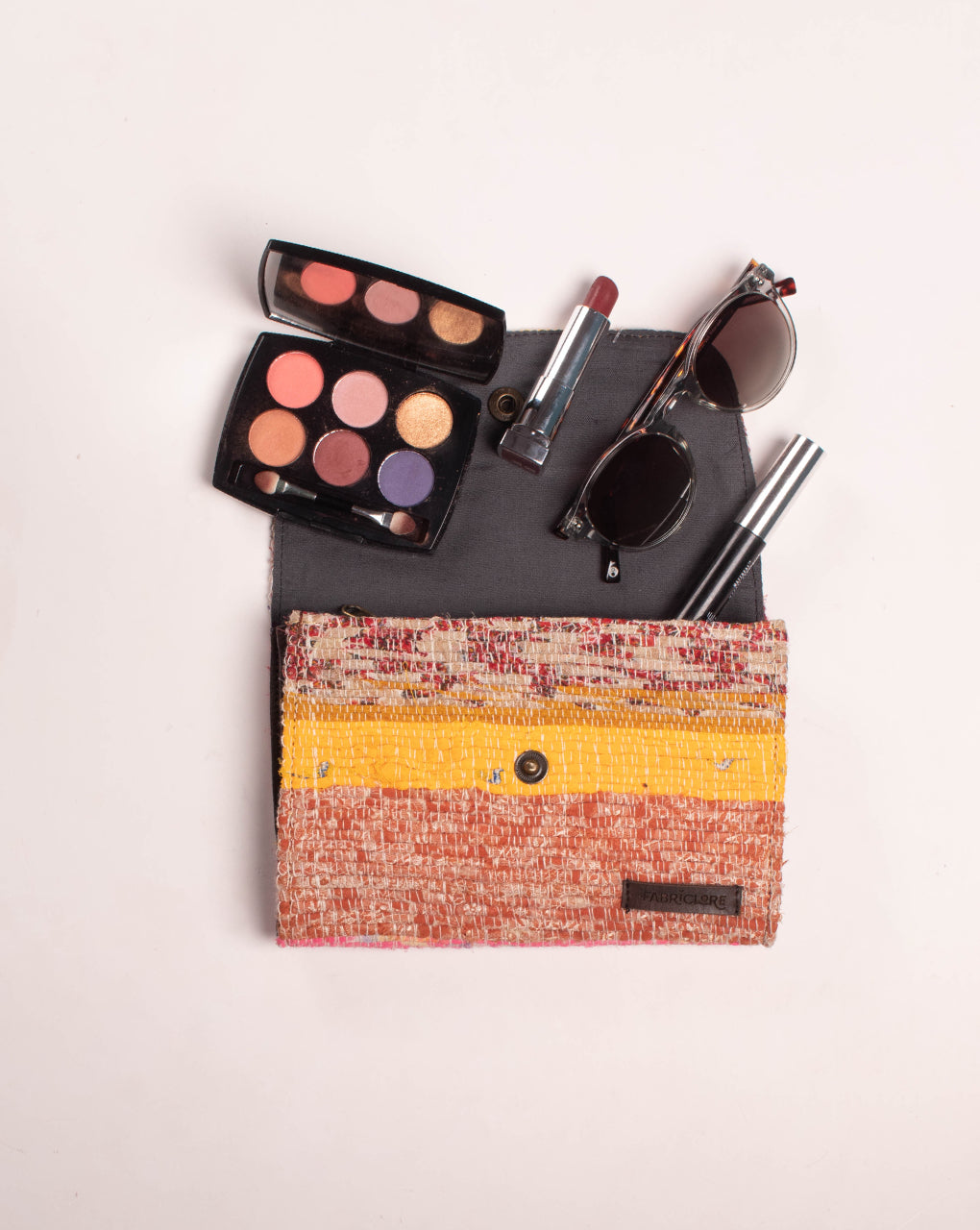 Handcrafted Rug Clutch - Fabriclore.com