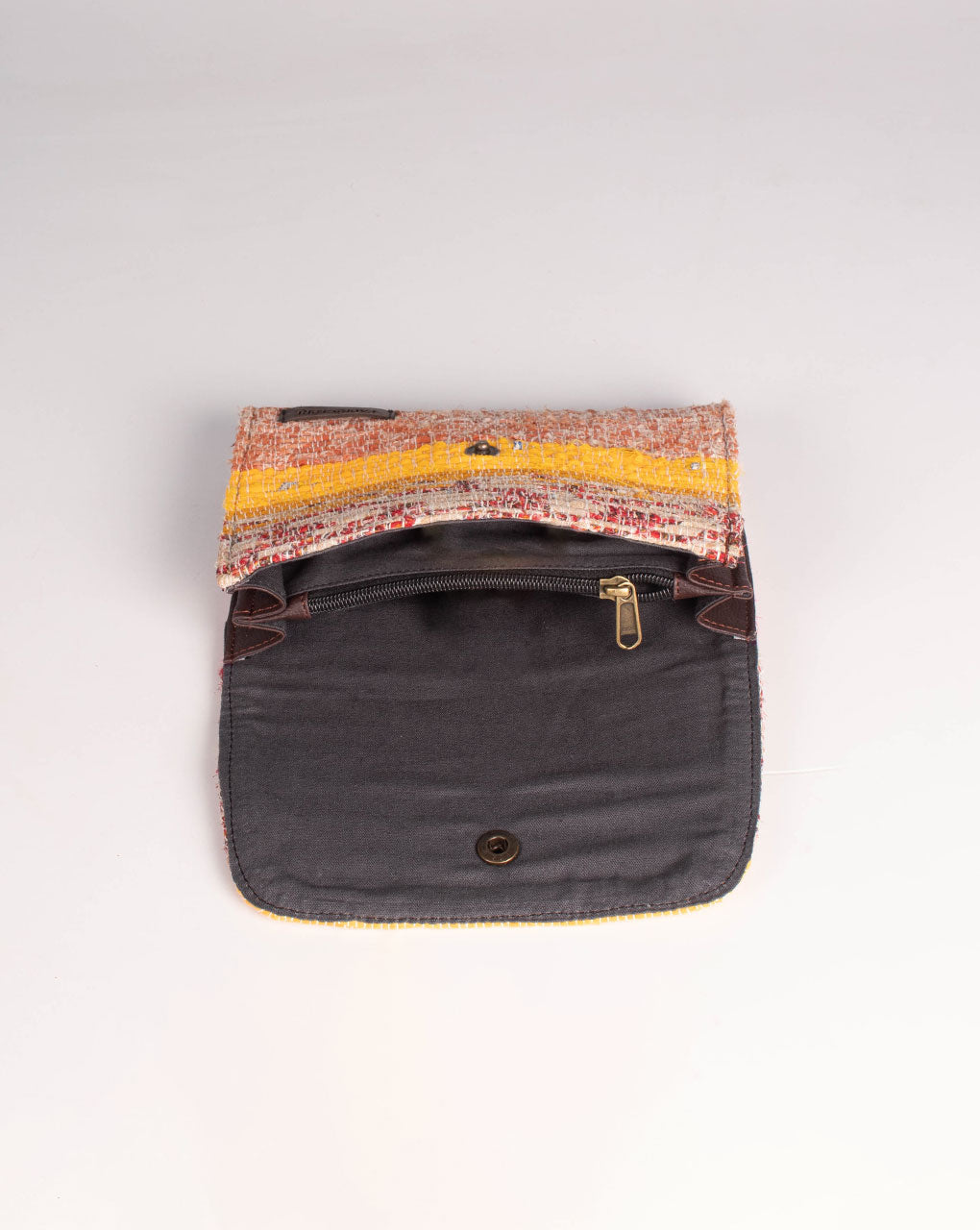 Handcrafted Rug Clutch - Fabriclore.com