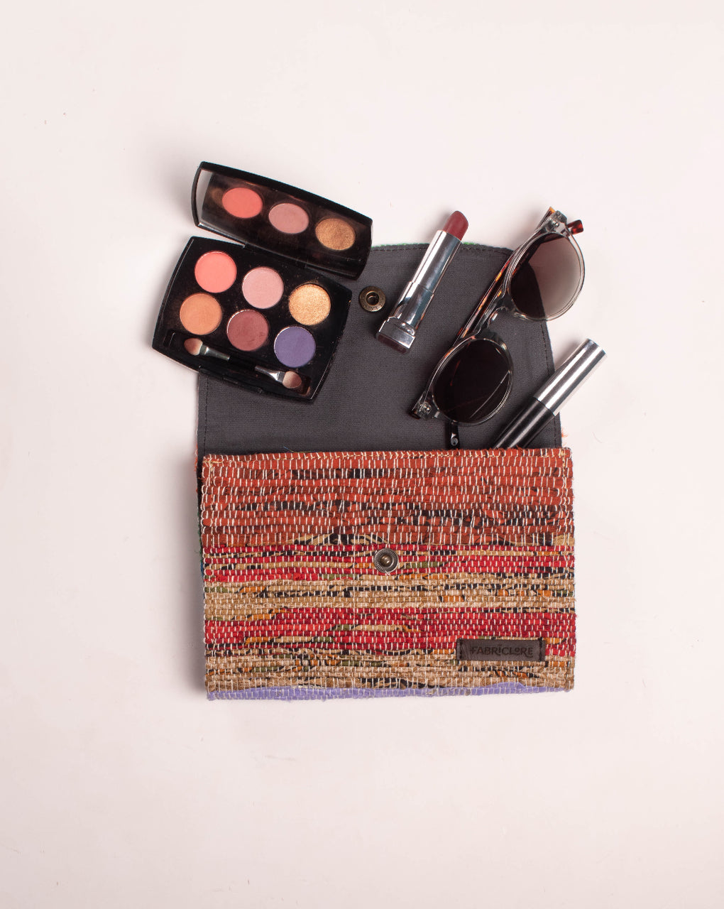 Handcrafted Rug Clutch - Fabriclore.com