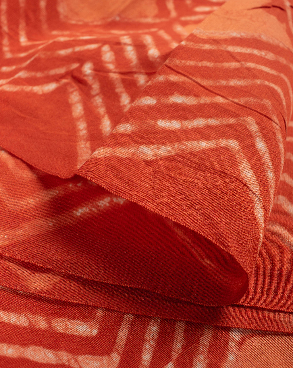 Chevron Dabu Hand Block Mercerized Chanderi Fabric - Fabriclore.com