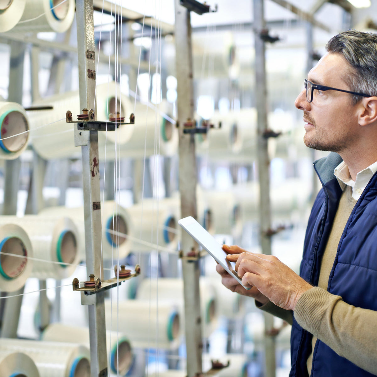 Top 10 Low MOQ Garment Manufacturers in Germany 26 https://fabriclore.com/cdn/shop/articles/man-stock-plastic-manufacturing-with-warehouse-industry-tablet-storage-industrial-inspector-factory-logistics-freight-commercial-distribution-equipment-supplier-career.jpg?crop=center&height=1200&v=1750323862&width=1200