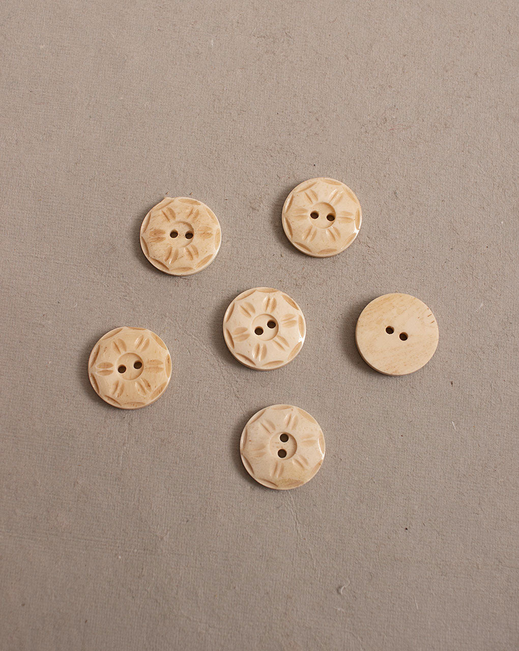 Hand Carved Bone Button ( Single Piece ) - Fabriclore.com
