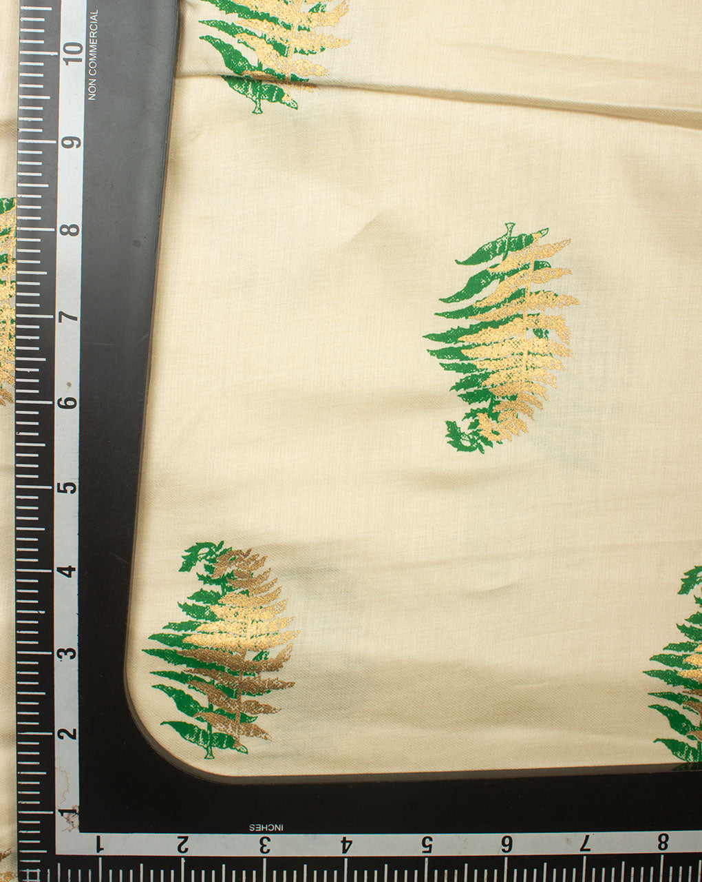 Off-White Green Floral Foil Screen Print Glazed Cotton Fabric - Fabriclore.com