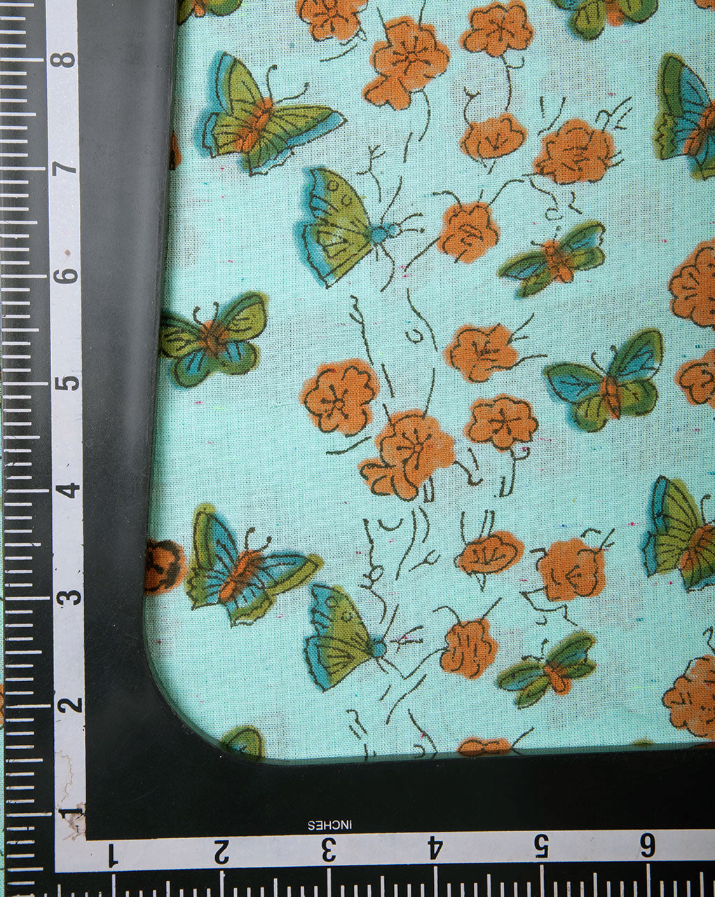 Sea Green Orange Creature Print Hand Block Neps Cotton Fabric - Fabriclore.com