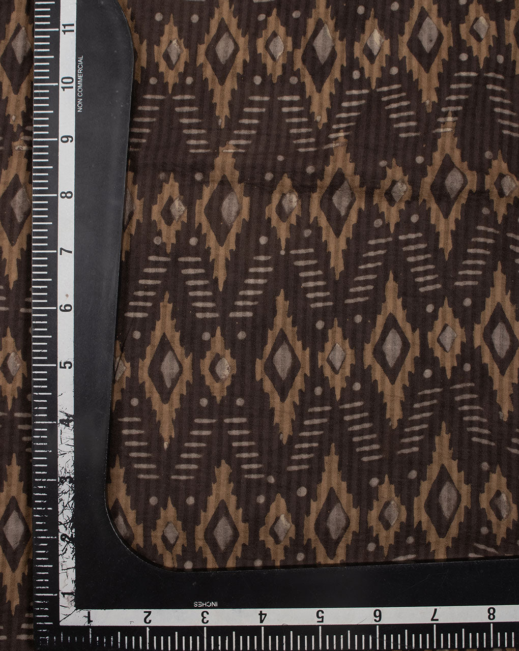 Brown Geometric Pattern Missing Dent Hand Block Cotton Fabric - Fabriclore.com
