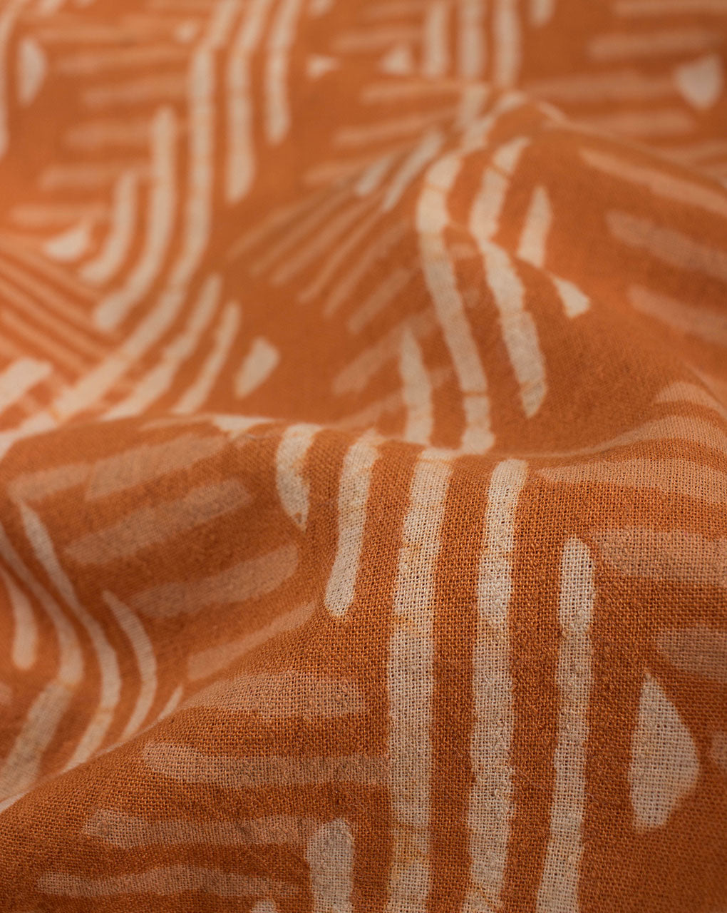Orange Chevron Dabu Hand Block Dobby Cotton Fabric - Fabriclore.com