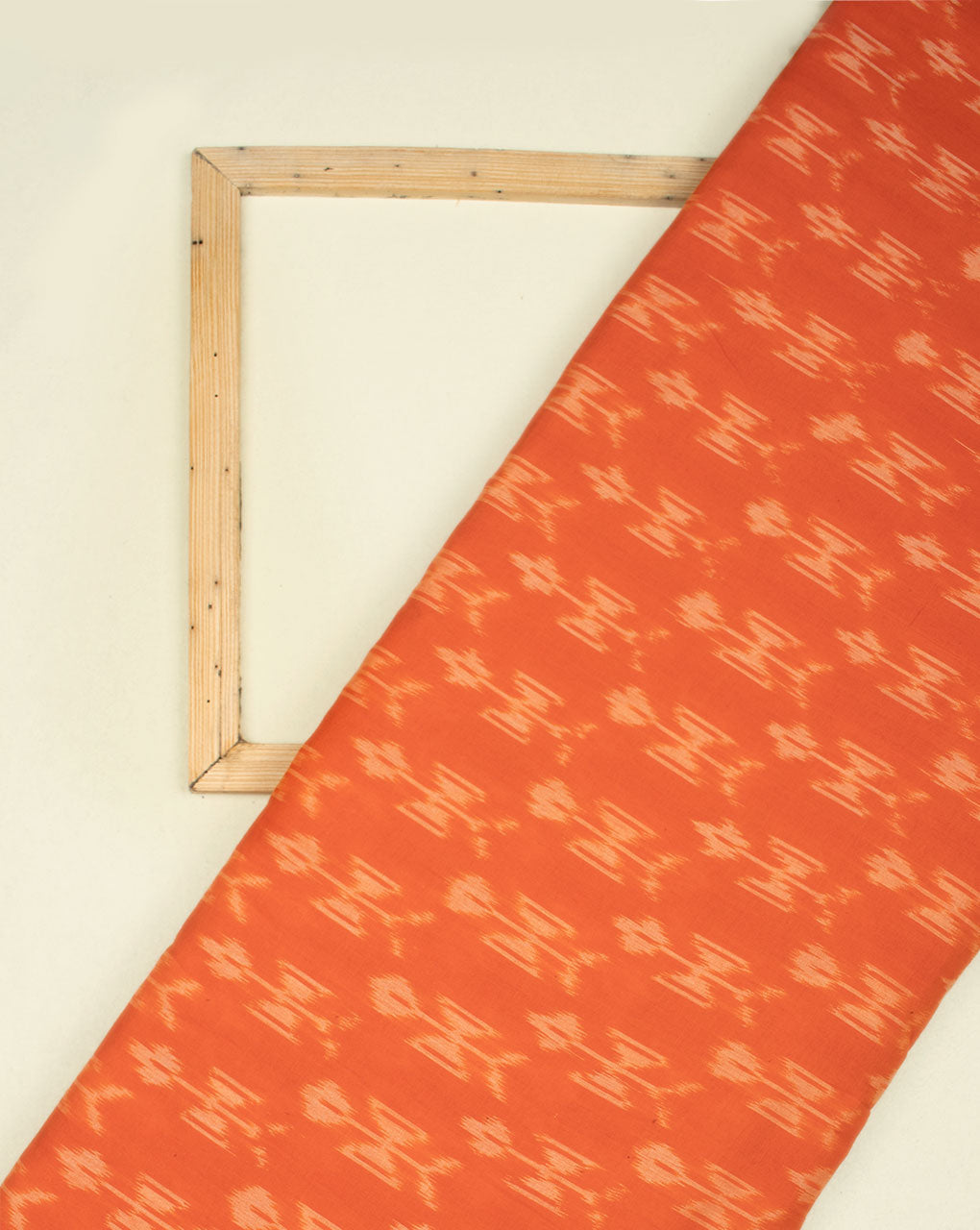 Orange & Off-White Warli Pattern Woven Mercerized Ikat Cotton Fabric - Fabriclore.com