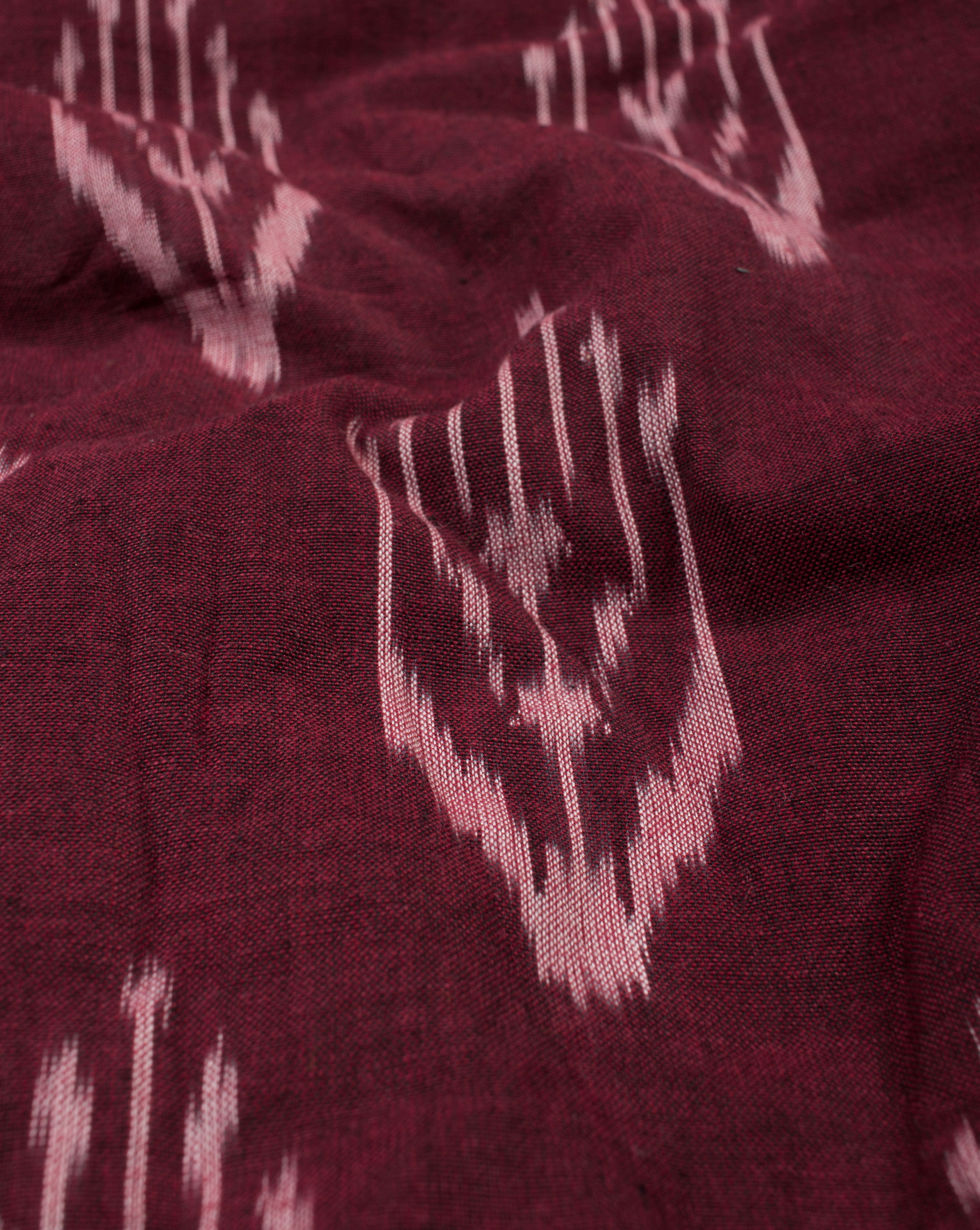 Maroon Abstract Pattern Woven Fine Ikat Cotton Fabric - Fabriclore.com