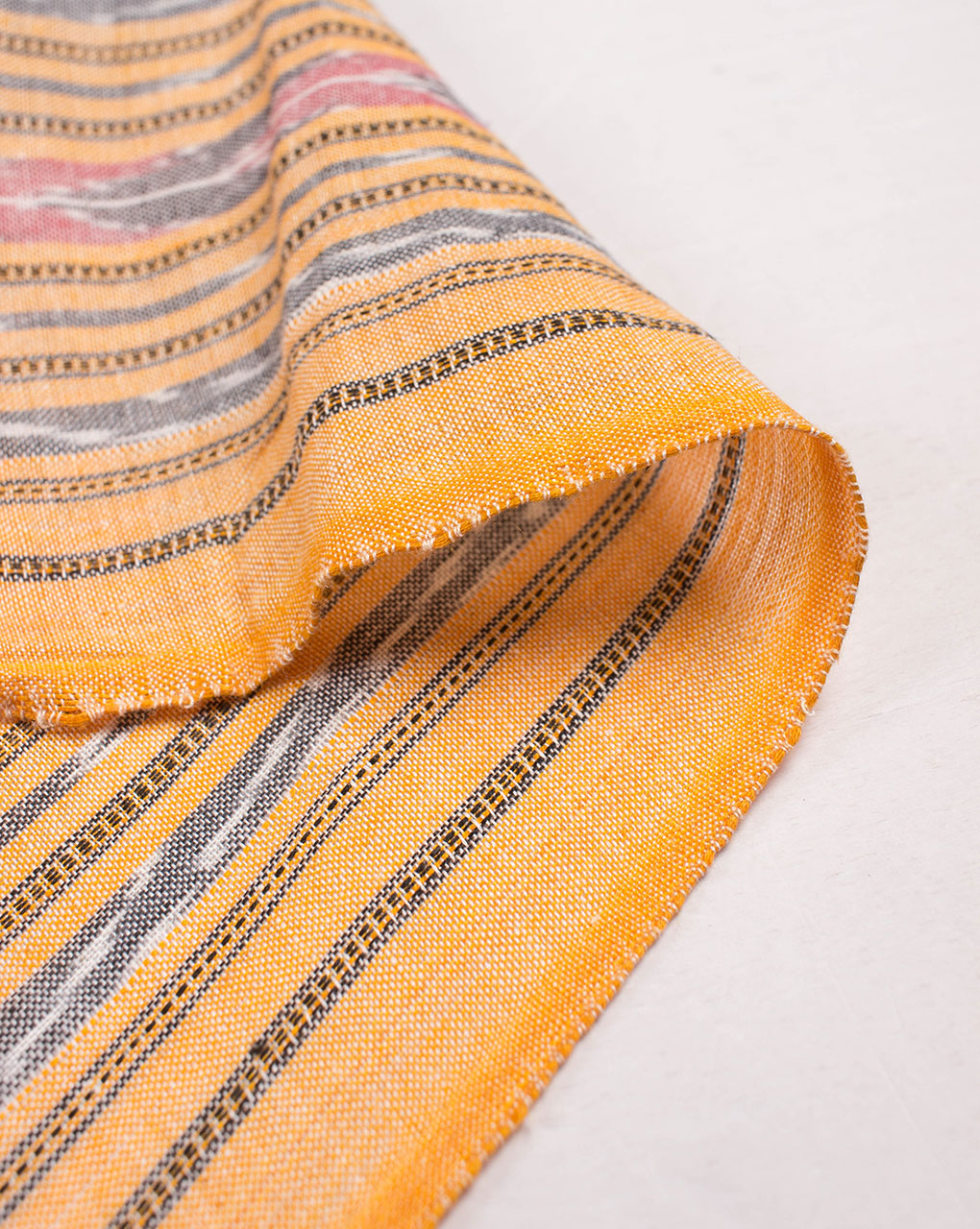 Light Orange Stripes Woven Sambalpuri Ikat Cotton Fabric - Fabriclore.com