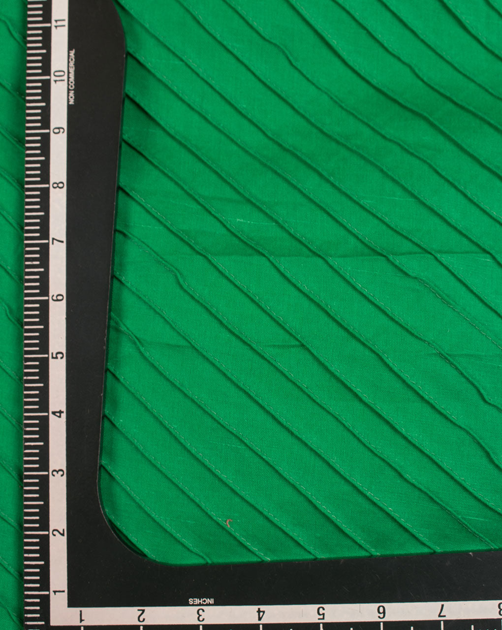 Green Pin-Tucks Flex Cotton Fabric - Fabriclore.com