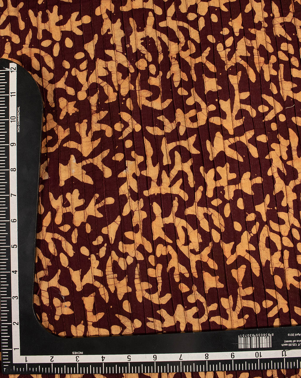 Wax Batik Pin-Tucks Cotton Fabric - Fabriclore.com