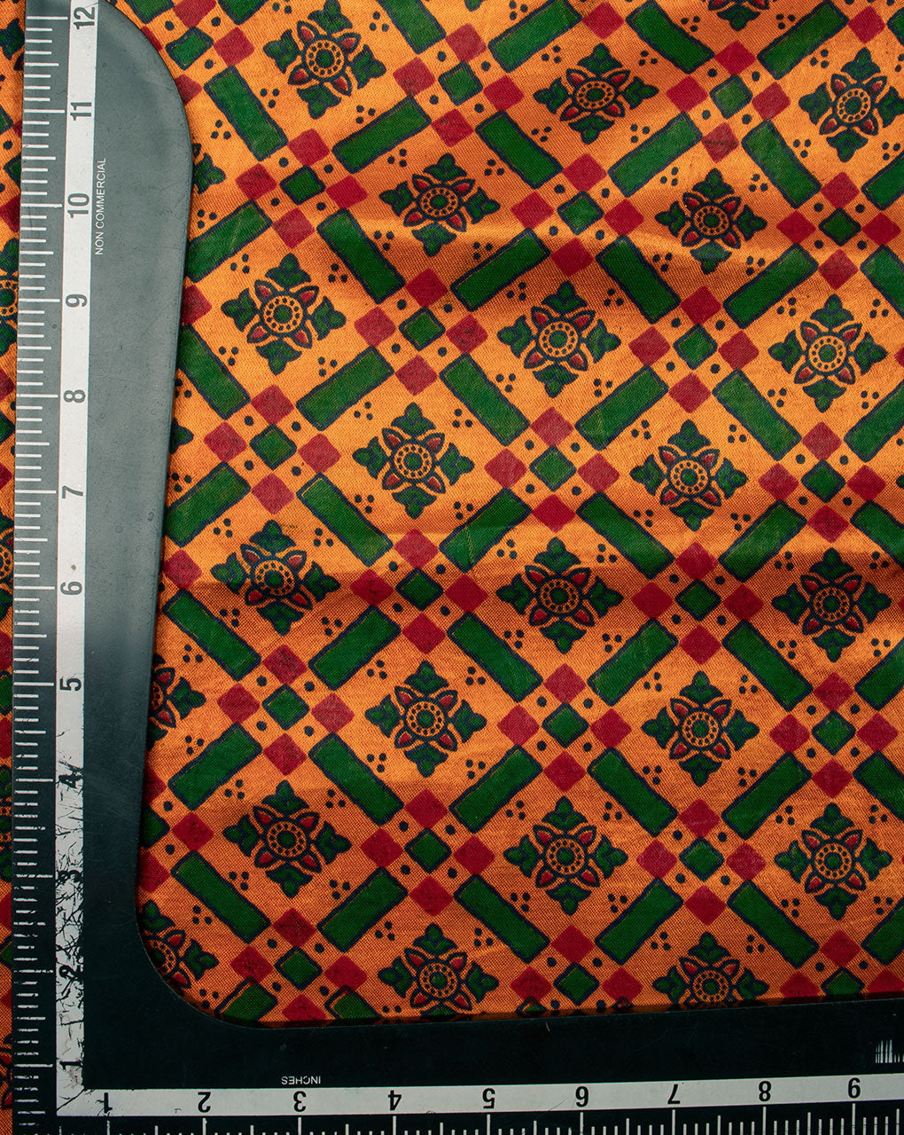 Orange Green Geometric Screen Print Ajrak Mashru Silk Fabric - Fabriclore.com