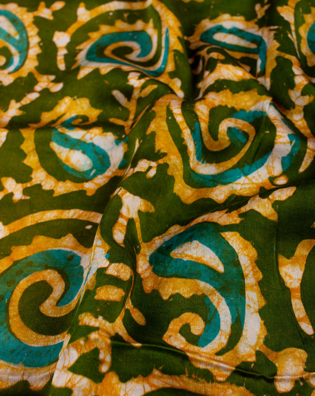 Paisley Pattern Hand Block Wax Batik Modal Satin Fabric - Fabriclore.com