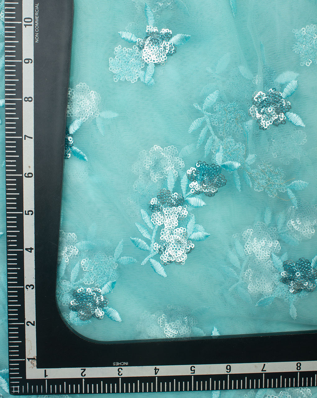 Turquoise & Silver Floral Embroidered Net Fabric - Fabriclore.com