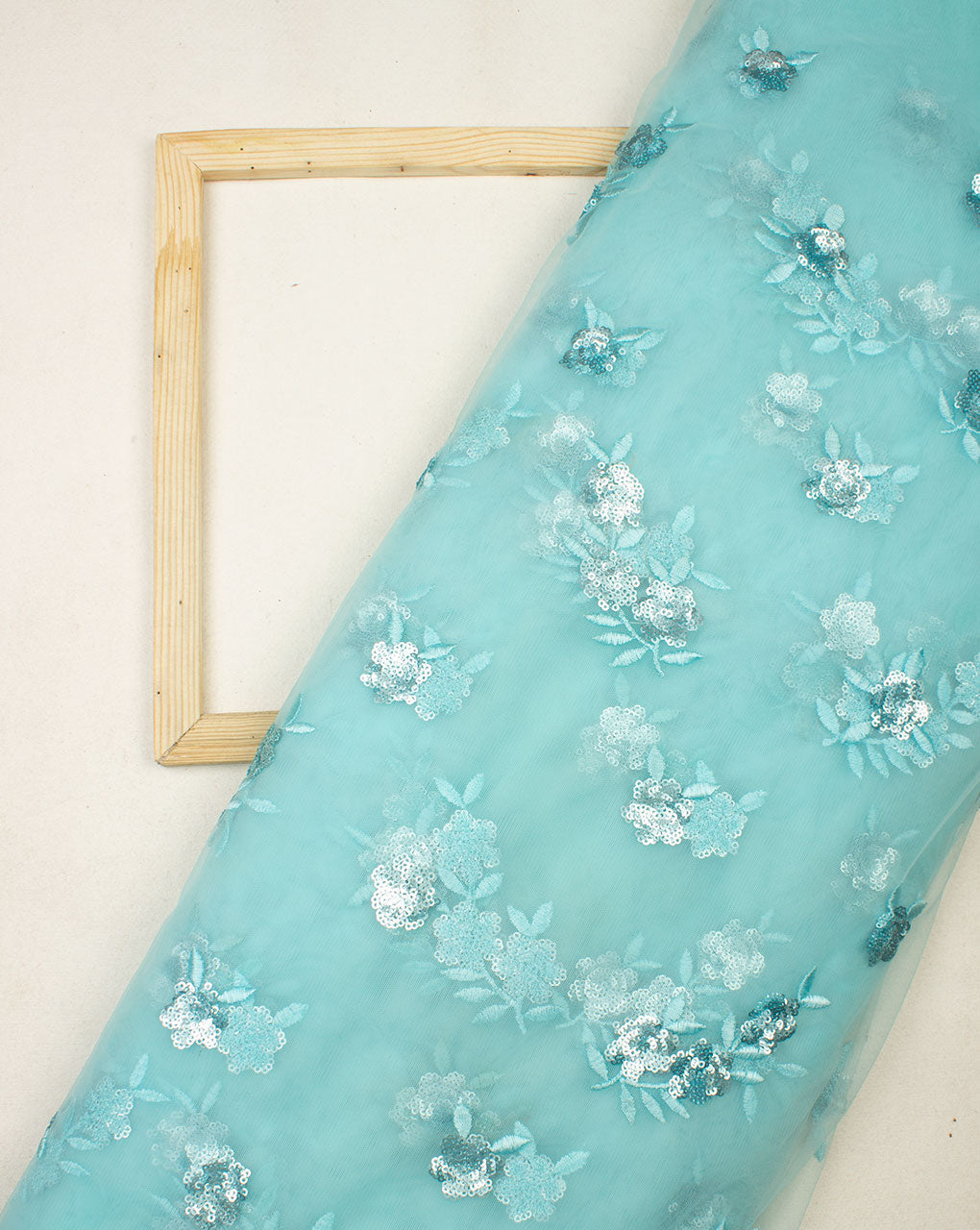 Turquoise & Silver Floral Embroidered Net Fabric - Fabriclore.com