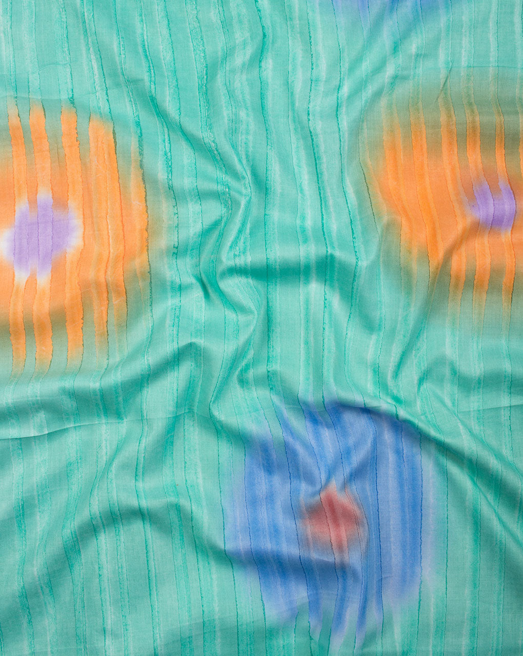 Green Orange Tie Dye Screen Print Rayon Fabric - Fabriclore.com