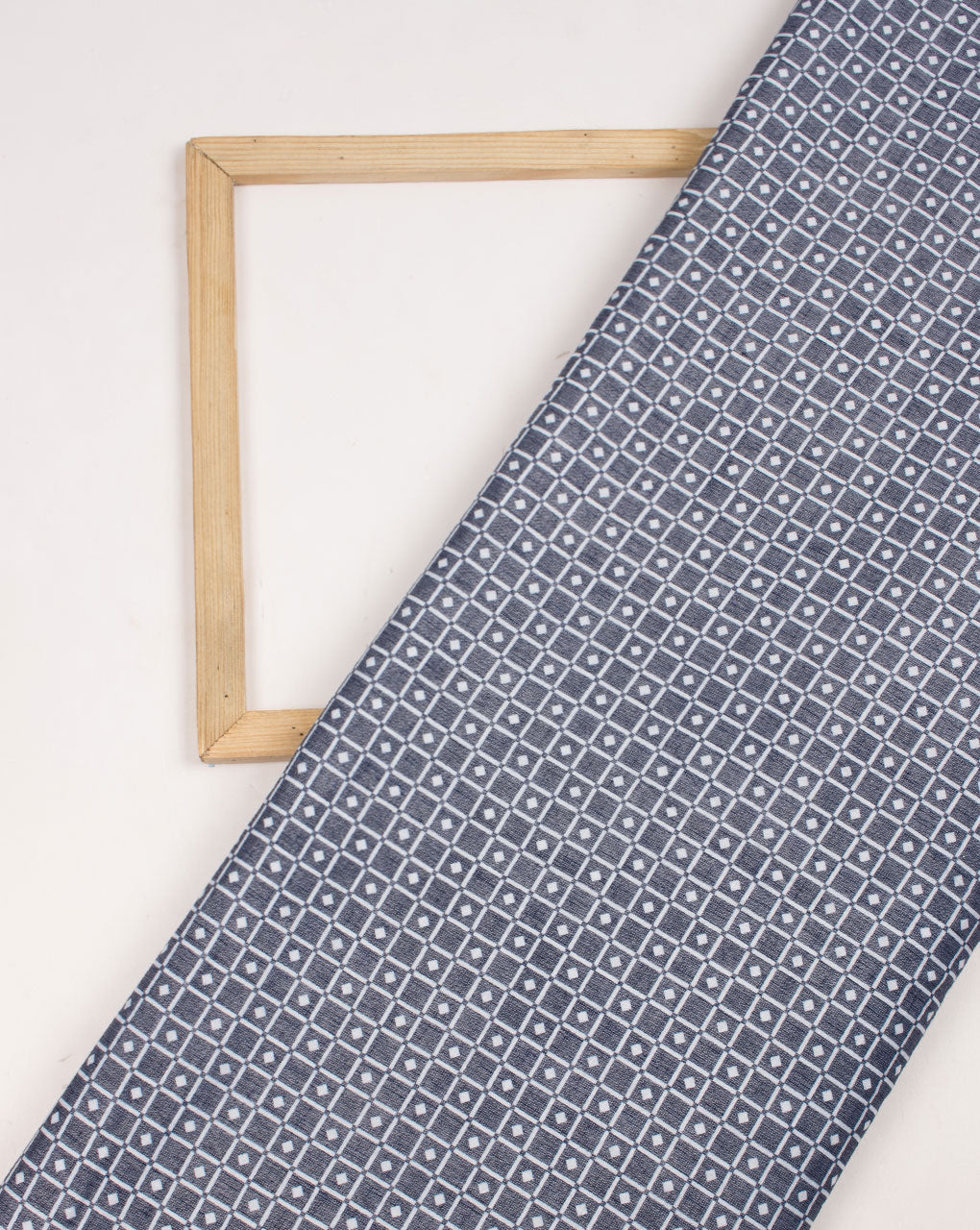 Blue Off-White Geometric Pattern Slub Rayon Fabric - Fabriclore.com