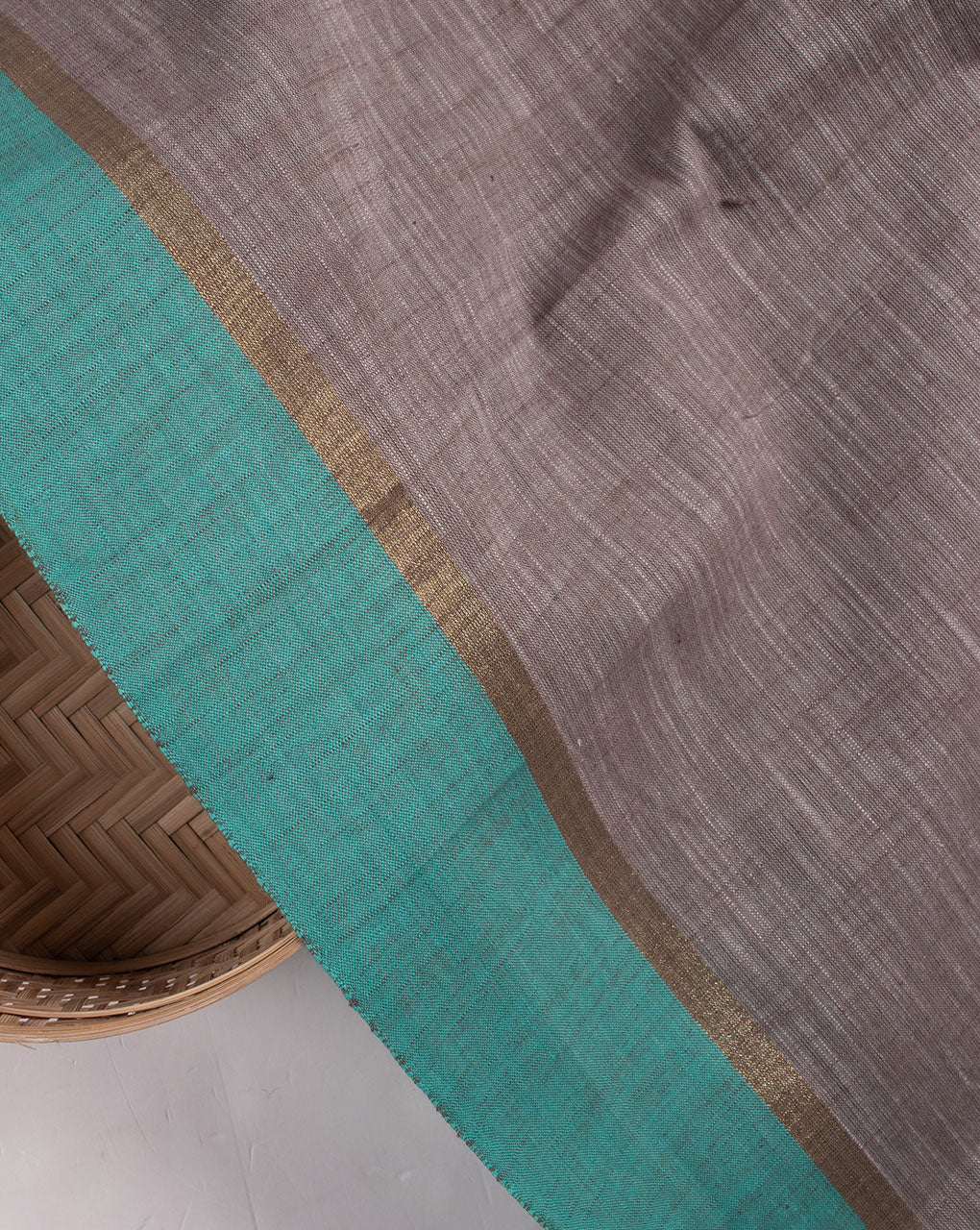 Grey Plain Zari Bordered Loom Textured Cotton Fabric - Fabriclore.com
