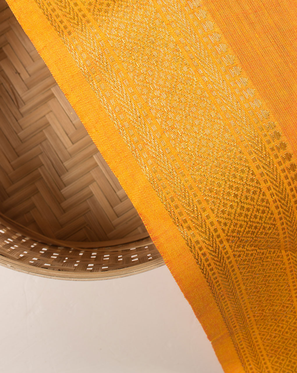 Orange Plain Zari Bordered Loom Textured Cotton Fabric - Fabriclore.com