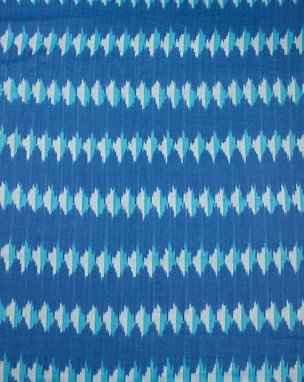 Woven Washed Ikat Cotton Fabric - Fabriclore.com
